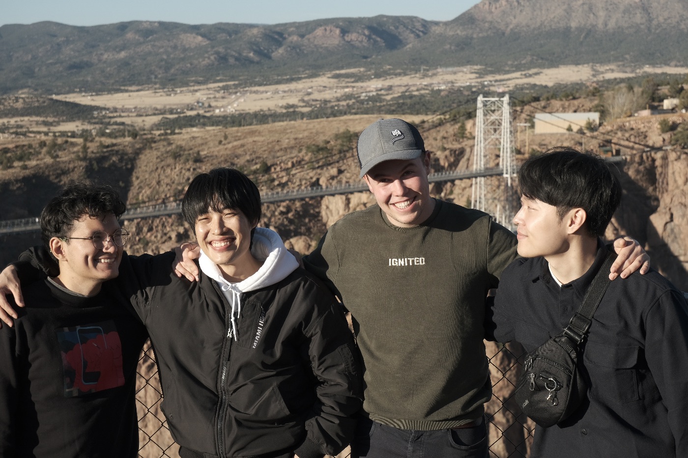 Four students together at a Colorado canyon overlook