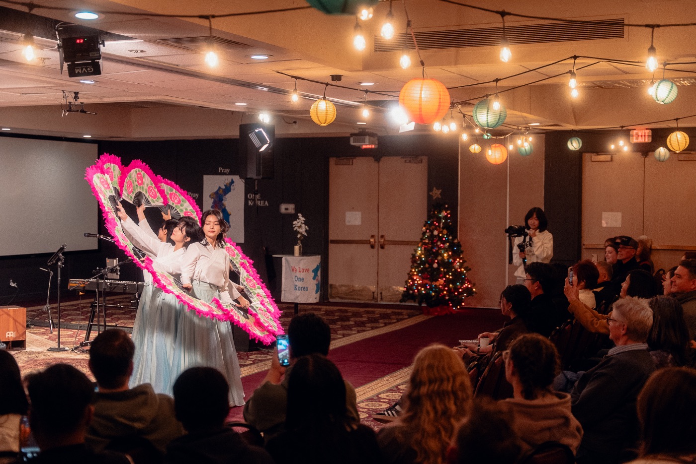 Korean fan dance performance at a One Korea Night gathering